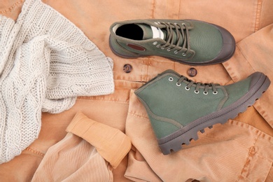 Comfortable casual female shoes on coat