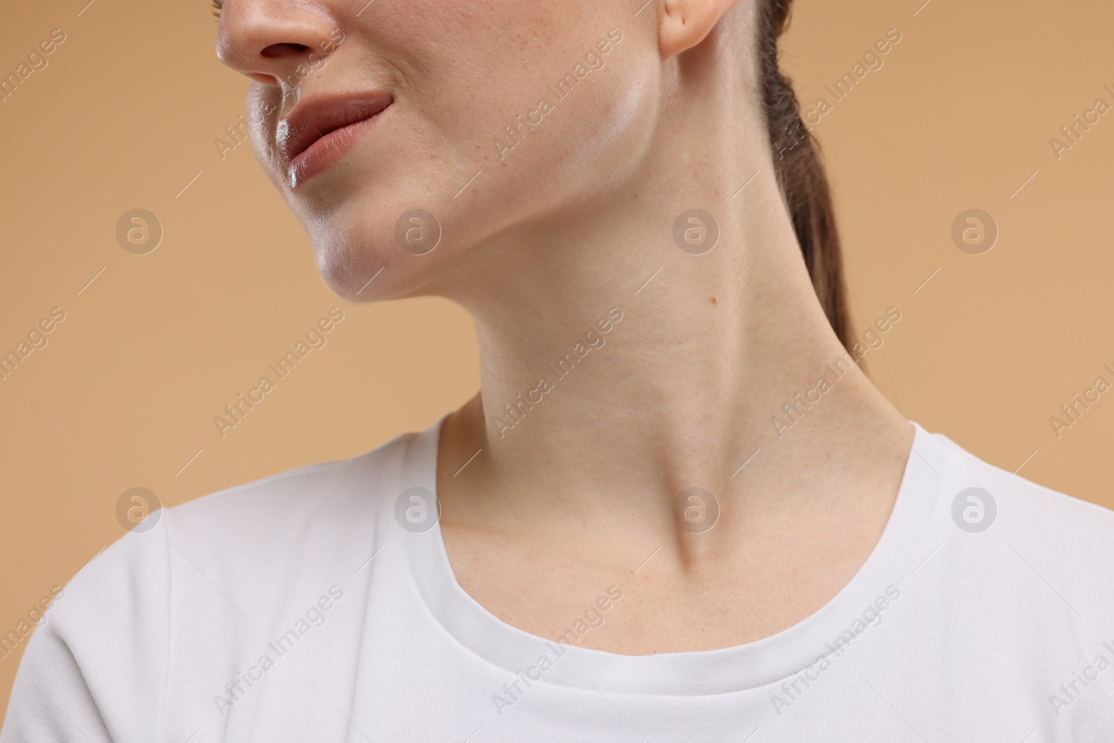 Photo of Beauty concept. Woman on beige background, closeup