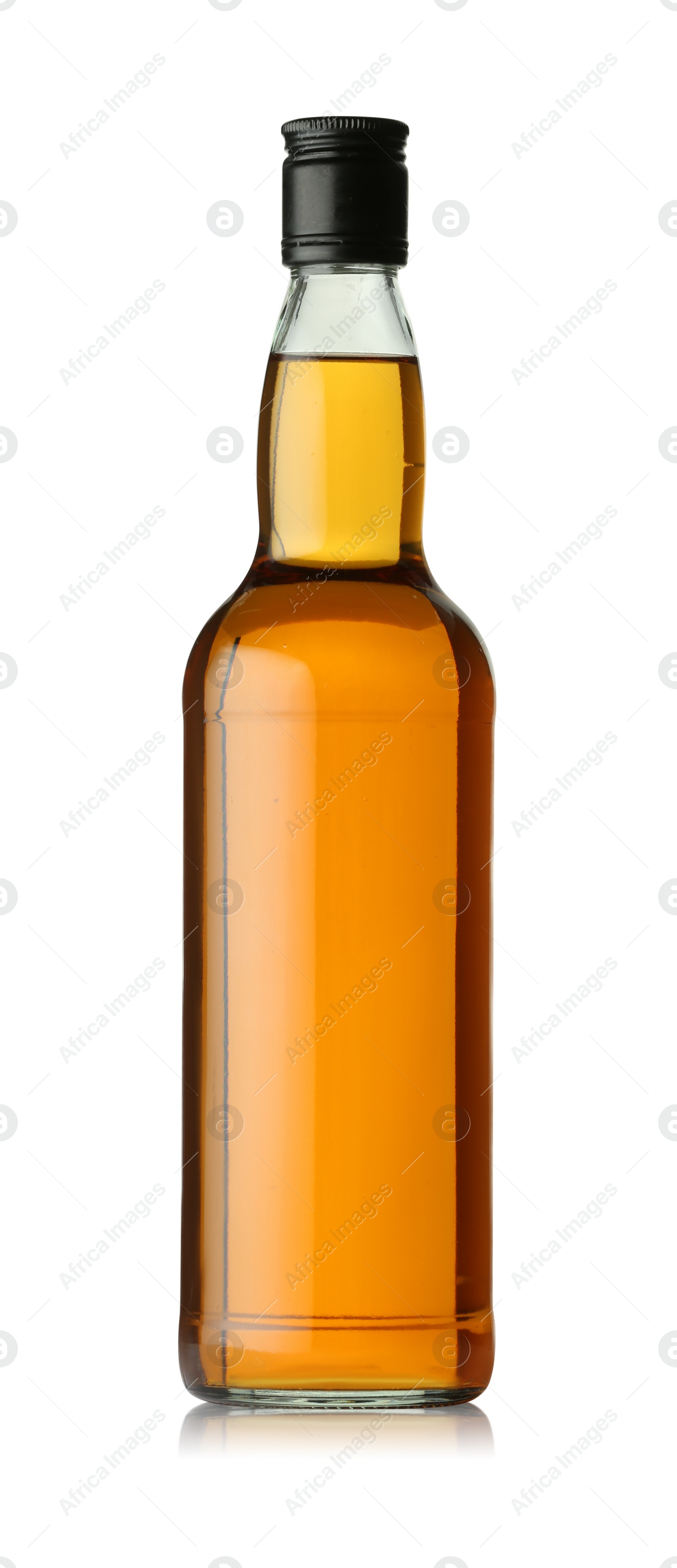 Photo of Whiskey in glass bottle isolated on white