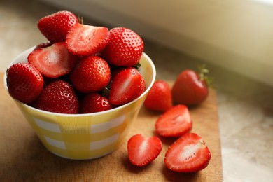 Photo of Fresh juicy strawberries on table, closeup. Space for text