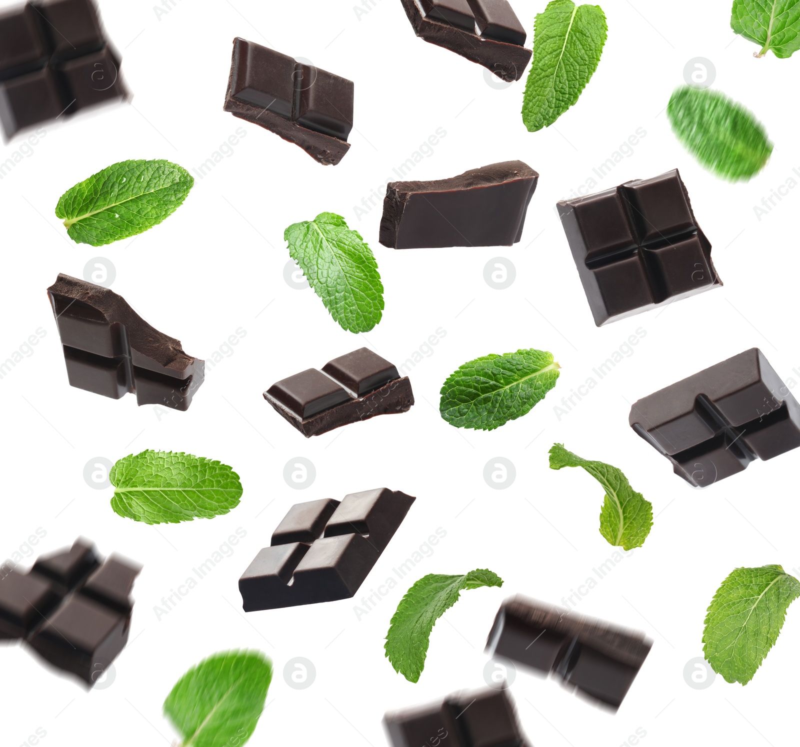 Image of Black chocolate pieces and mint falling on white background