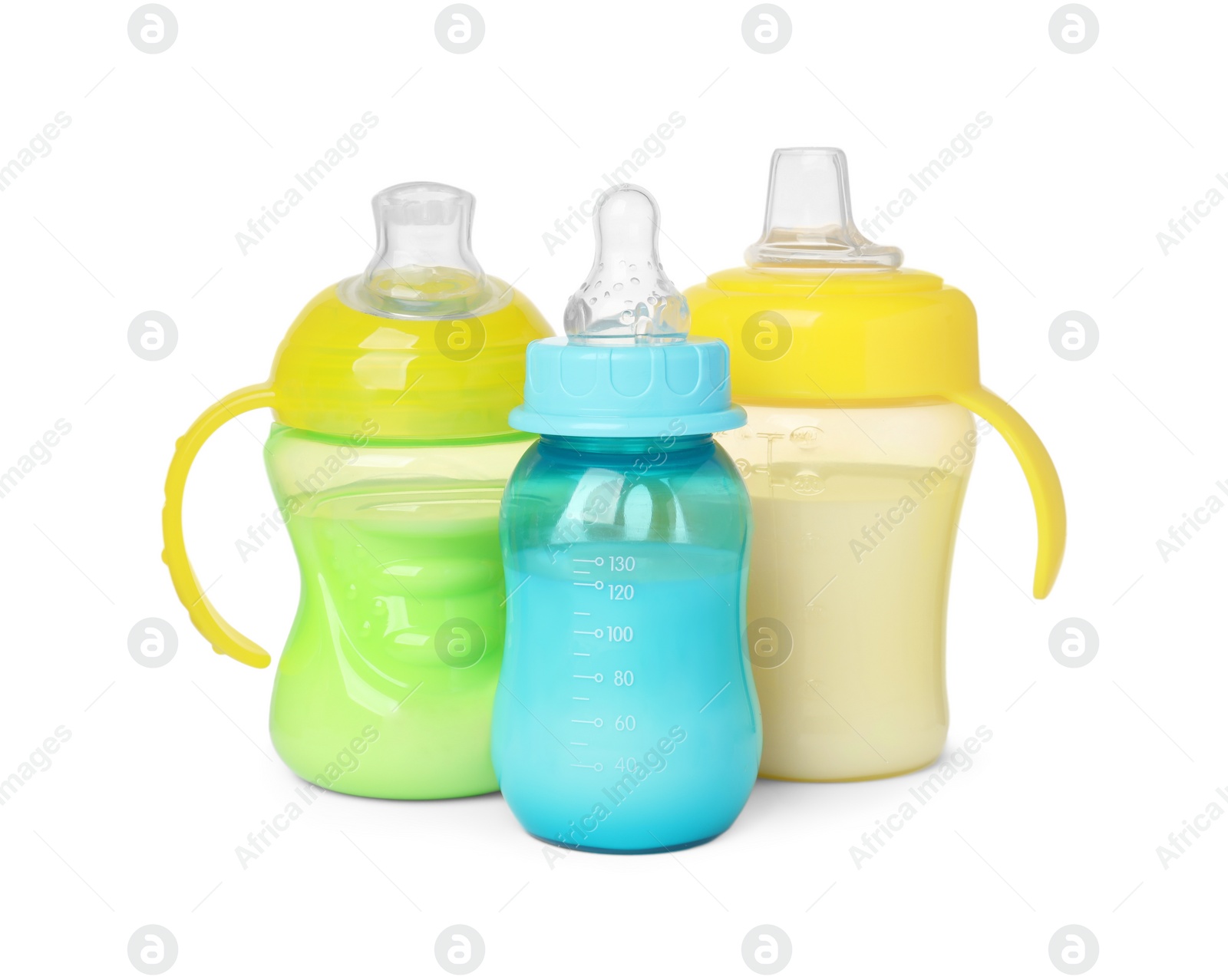 Photo of Feeding bottles with milk on white background