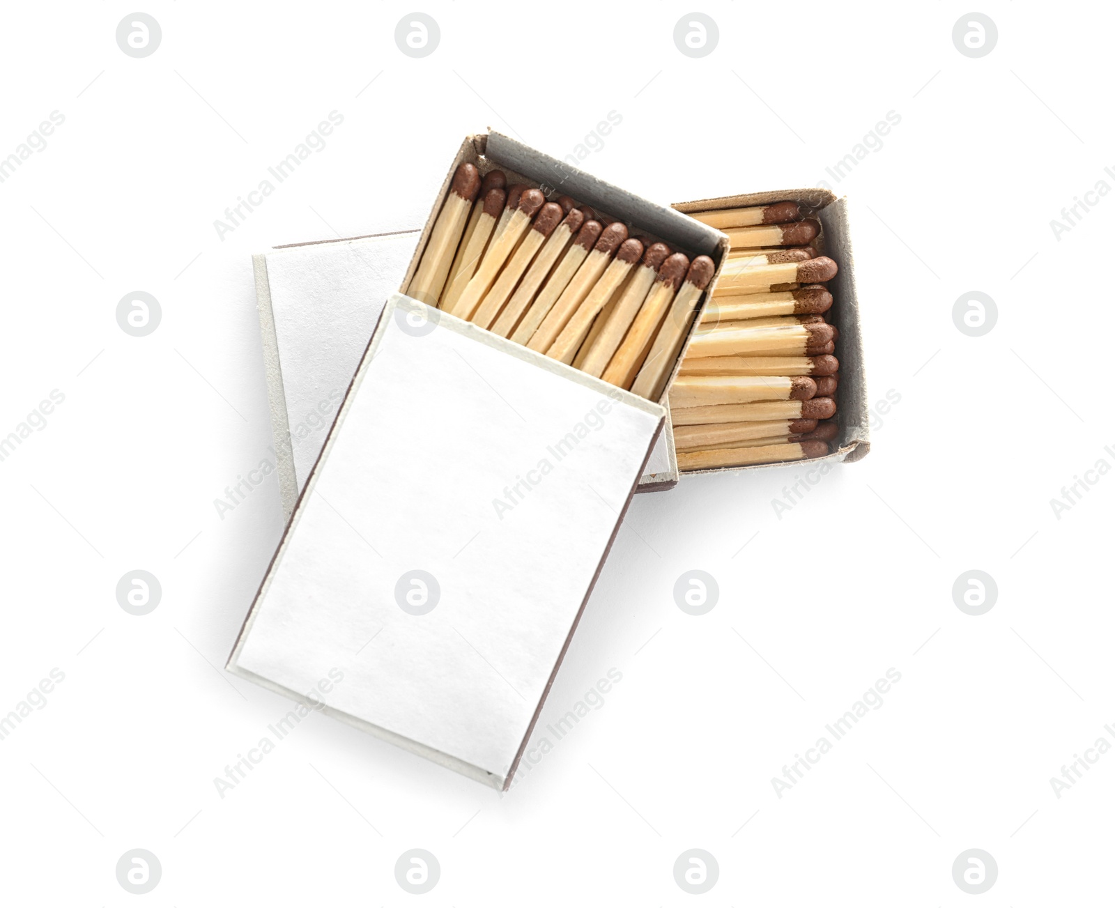 Photo of Cardboard boxes with matches on white background, top view. Space for design