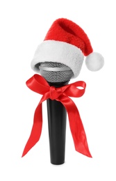 Microphone with Santa hat and red bow on white background. Christmas music