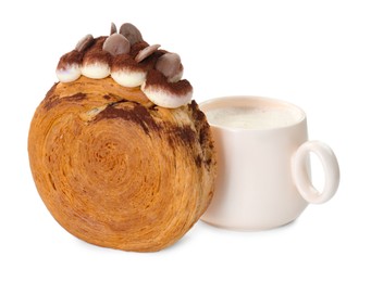 Photo of Round croissant with chocolate chips and cup of drink isolated on white. Tasty puff pastry