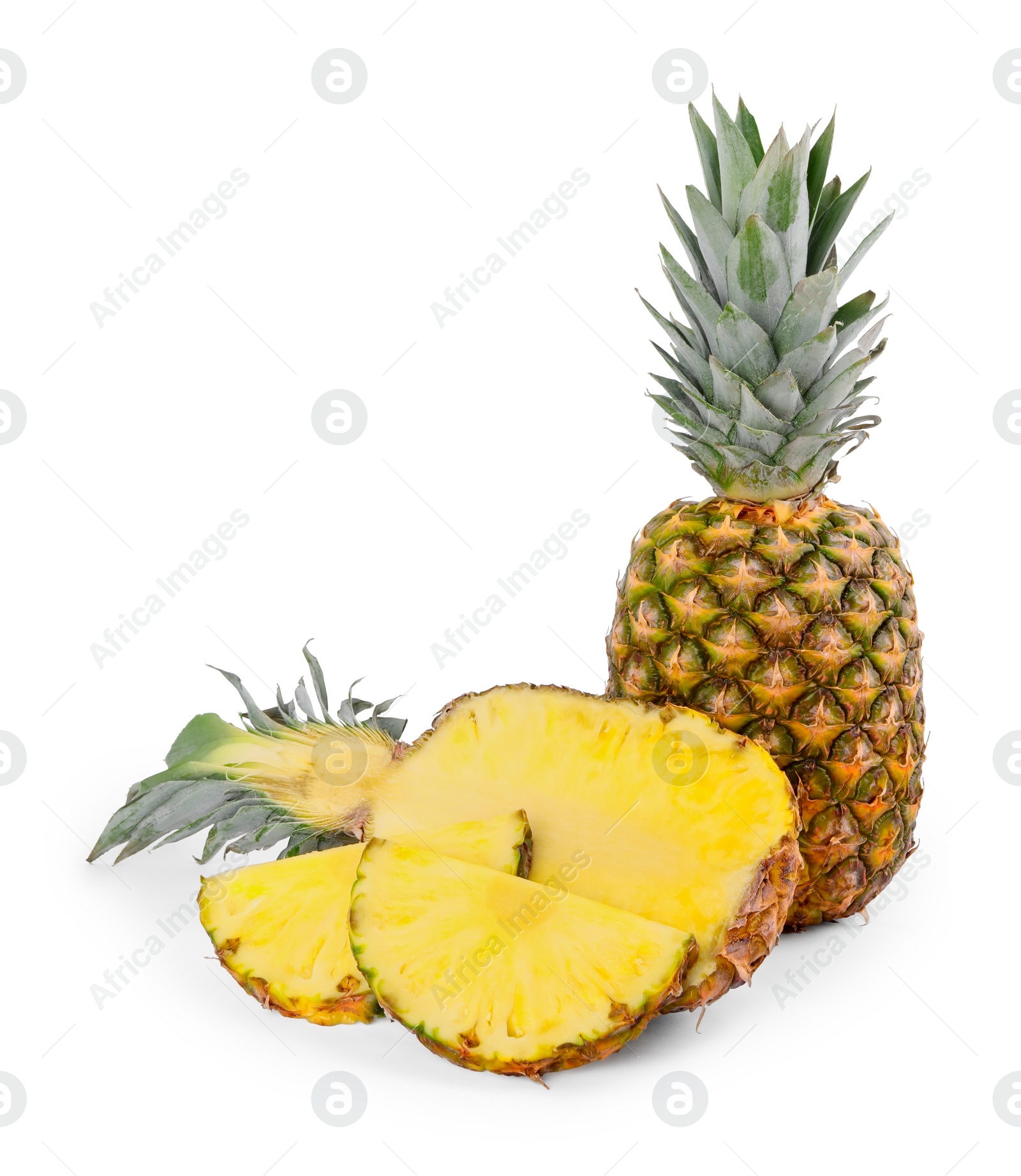 Photo of Whole and cut ripe pineapples isolated on white