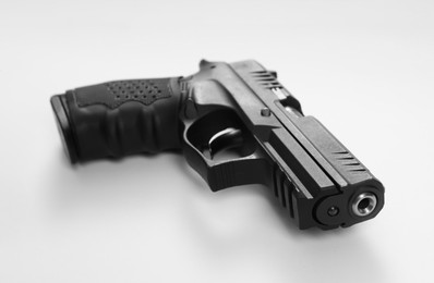 Photo of Standard handgun on white background. Semi-automatic pistol