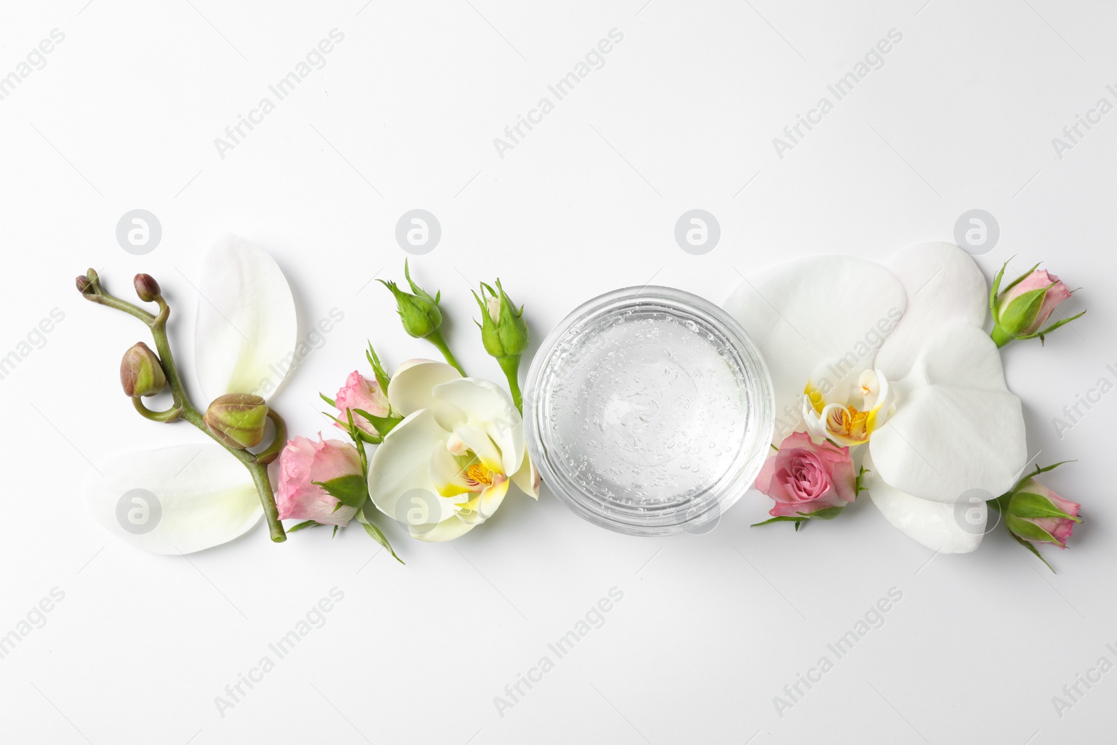 Photo of Composition with cosmetic gel and beautiful flowers on white background, top view