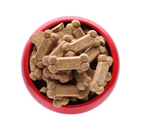 Photo of Bone shaped dog cookies in feeding bowl isolated on white, top view