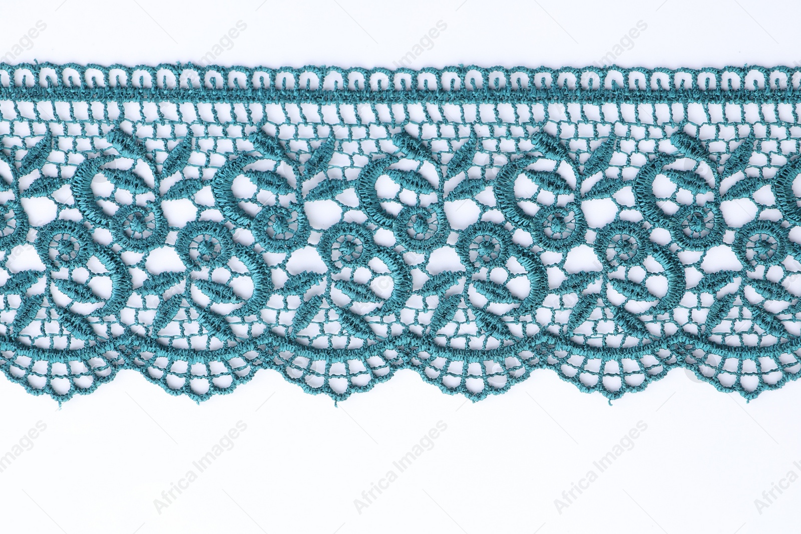 Photo of Beautiful lace on white background, top view