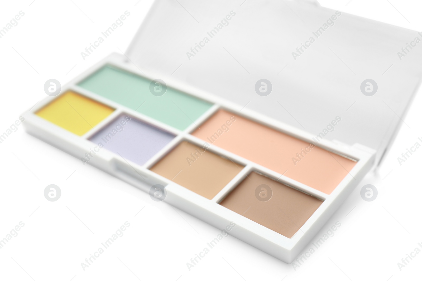 Photo of Colorful correcting concealer palette isolated on white