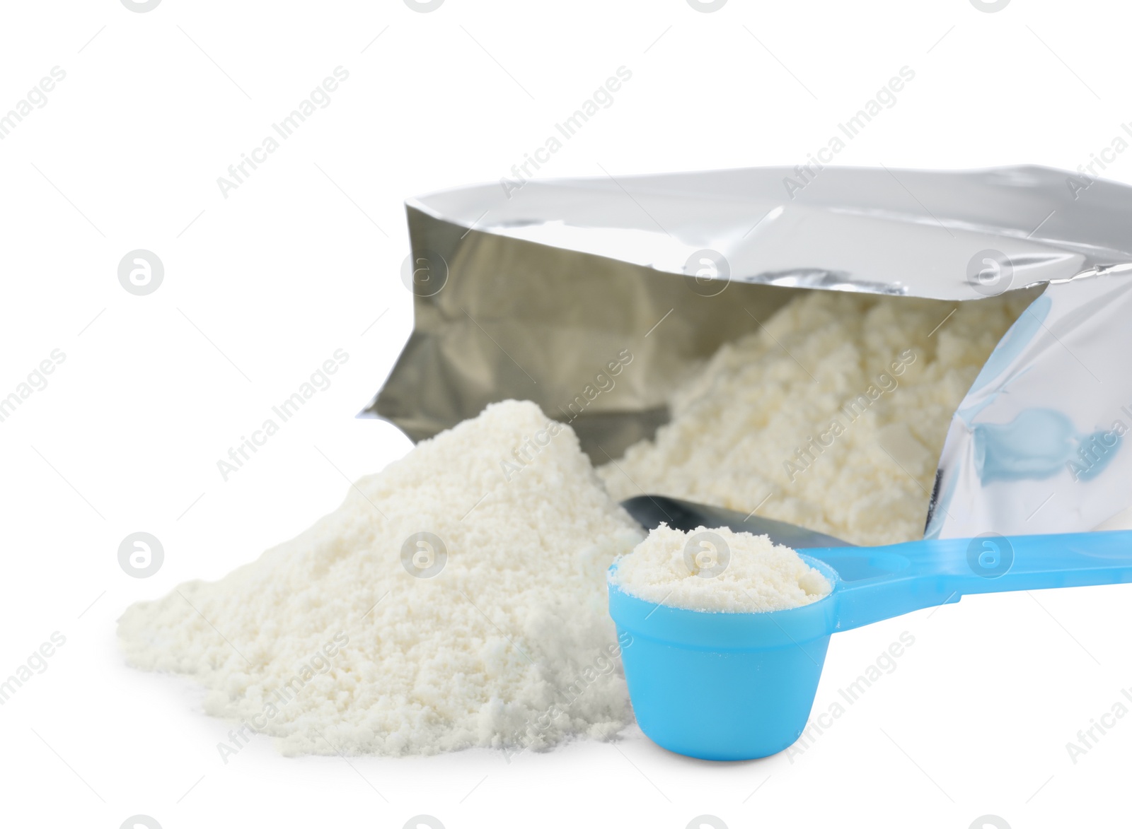 Photo of Bag of powdered infant formula and scoop on white background. Baby milk