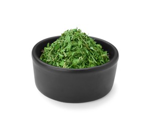 Photo of Dried aromatic parsley in bowl isolated on white