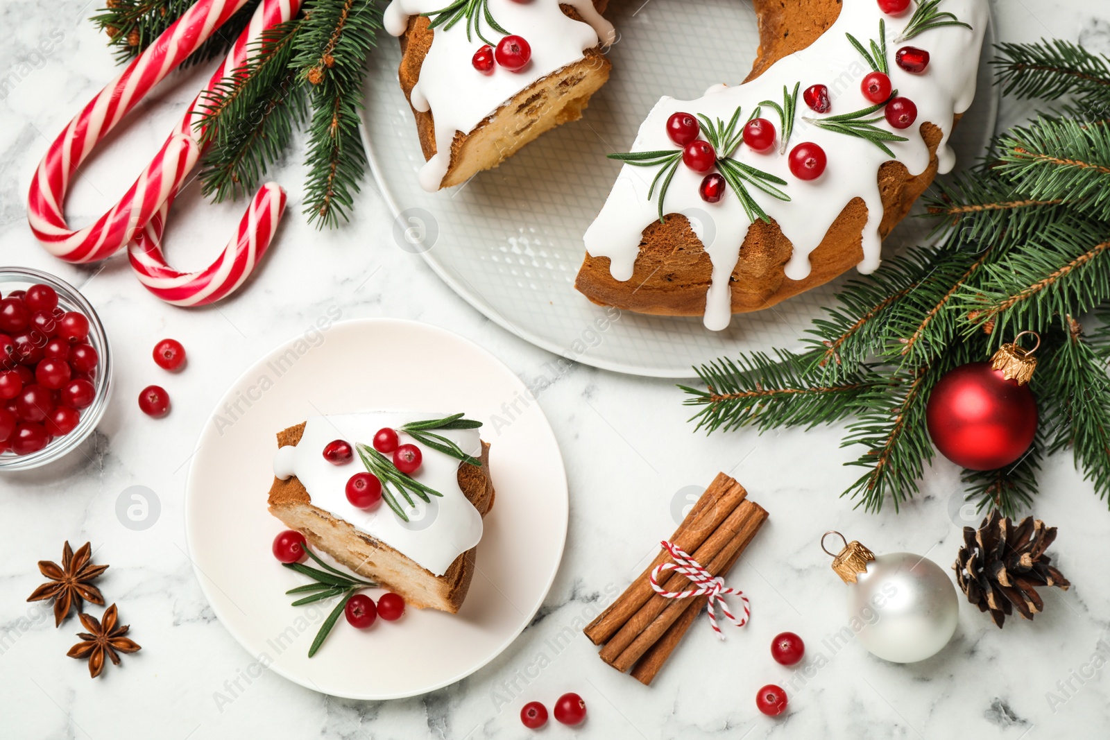 Photo of Flat lay composition with traditional homemade Christmas cake on white marble table