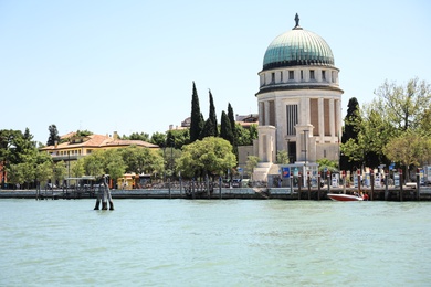 Photo of VENICE, ITALY - JUNE 13, 2019: Beautiful view of Santa Maria della Vittoria on sea shore