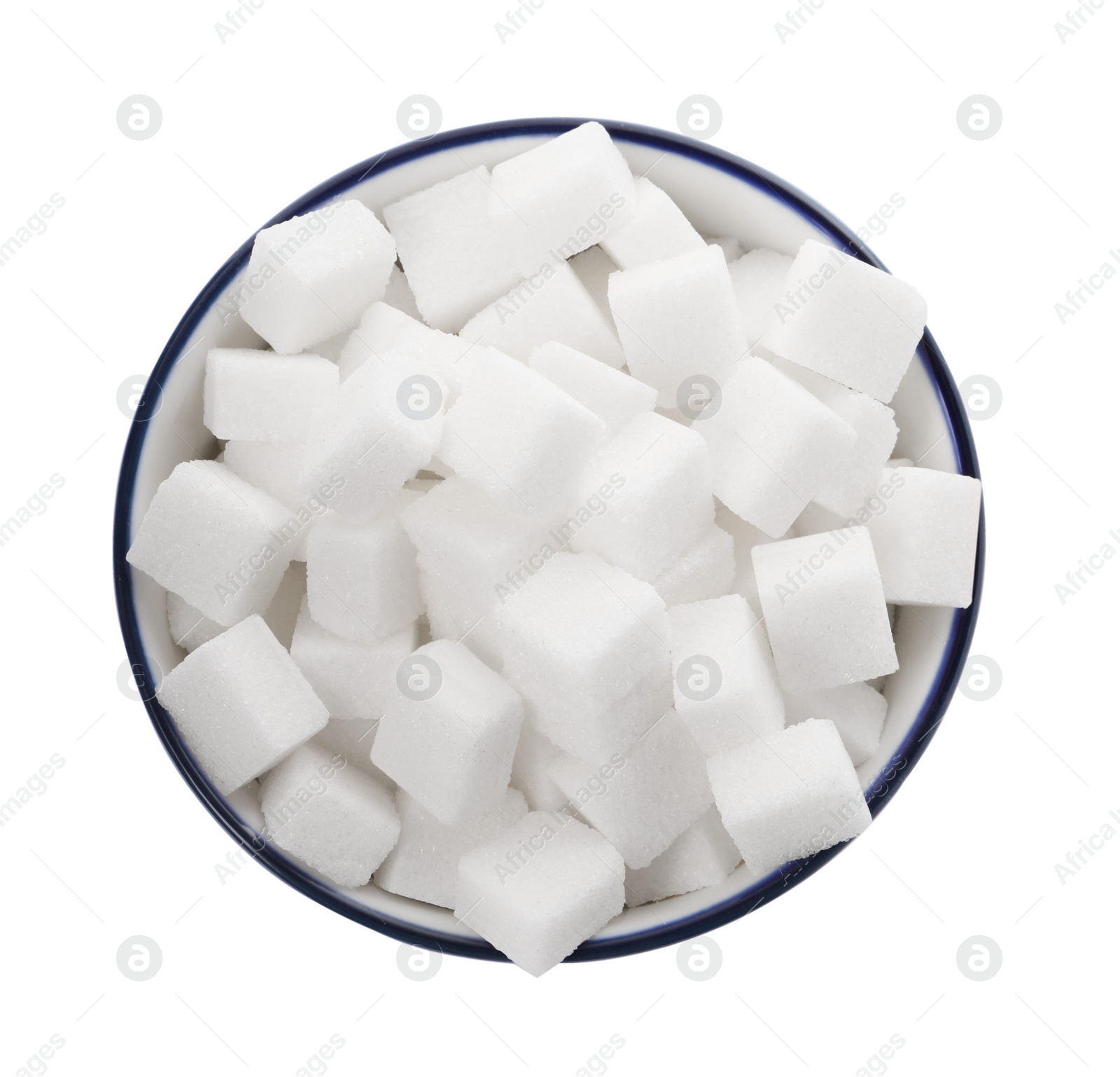 Photo of Bowl of refined sugar cubes isolated on white, top view