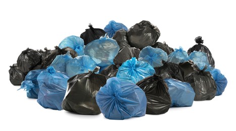 Image of Big heap of trash bags with garbage on white background