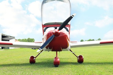 Photo of New ultralight aircraft on green grass outdoors