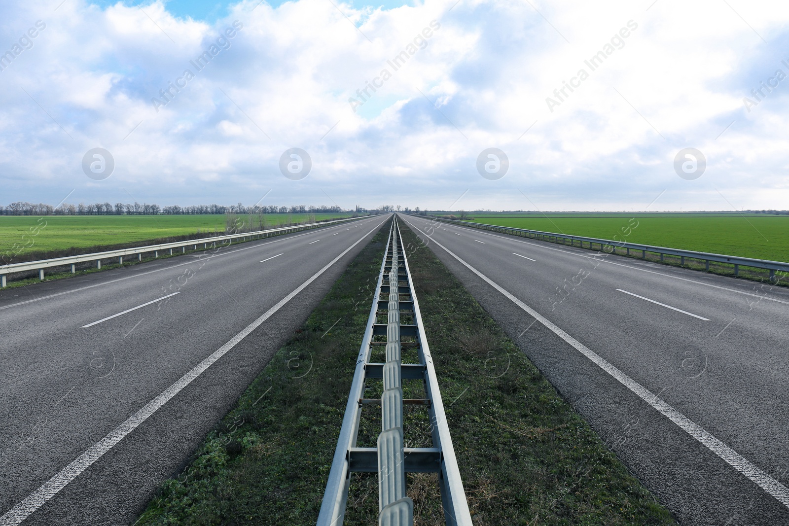 Photo of Beautiful view of asphalt highway without transport