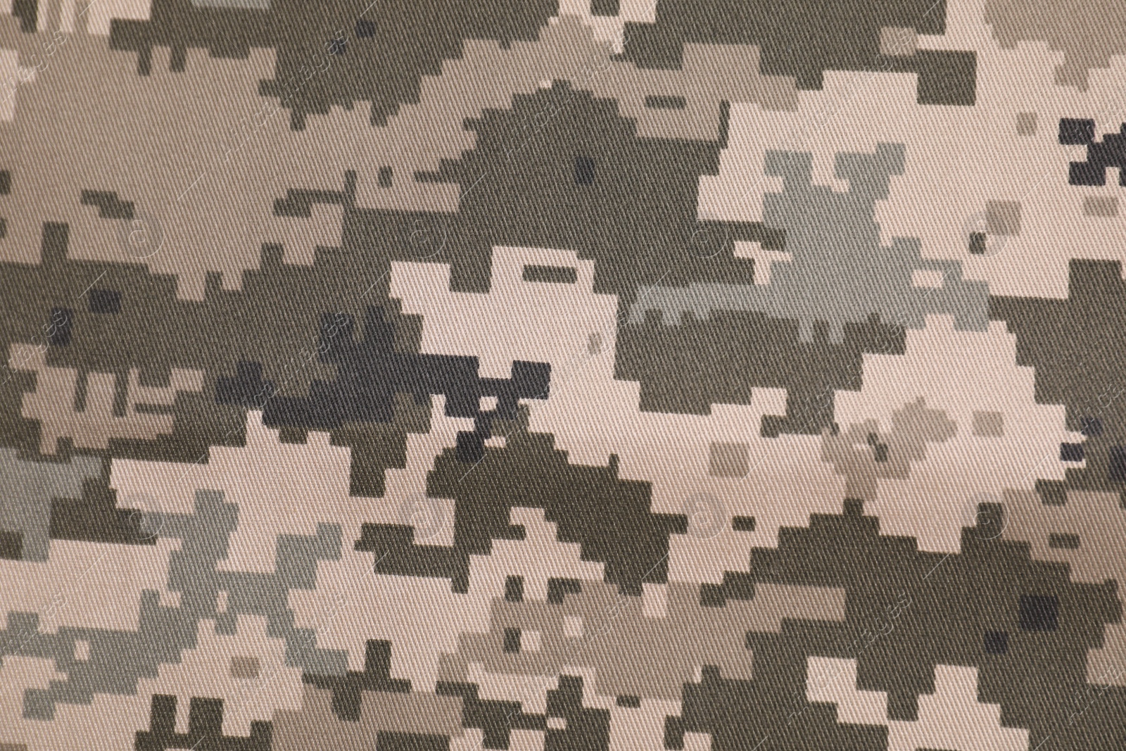 Photo of Texture of camouflage fabric as background, top view