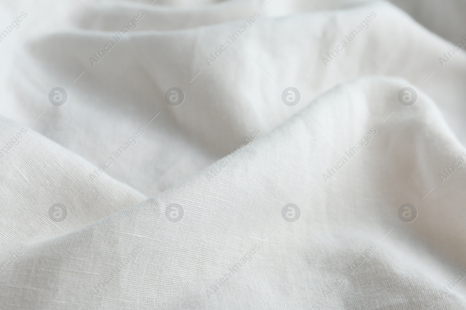 Photo of Texture of beautiful white fabric as background, closeup