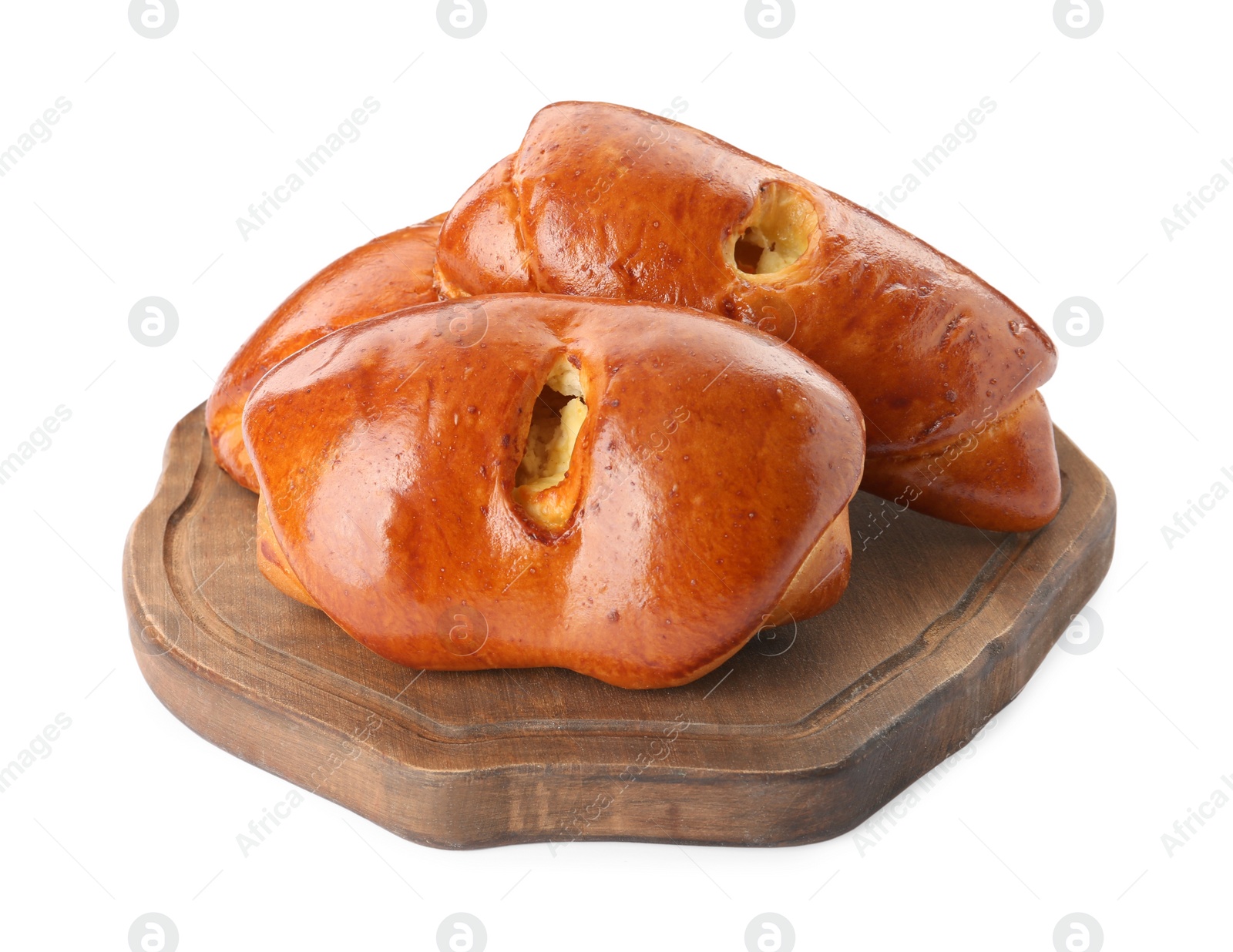 Photo of Wooden board with delicious baked patties on white background