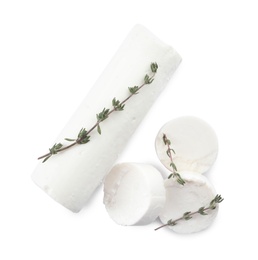 Delicious goat cheese with thyme on white background, top view