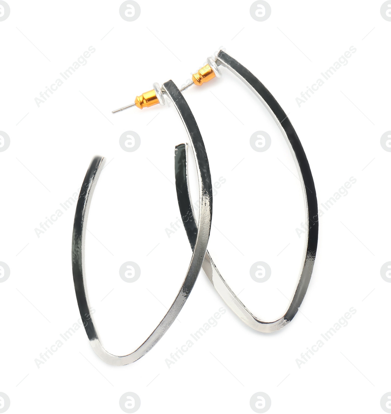 Photo of Pair of beautiful earrings isolated on white, top view