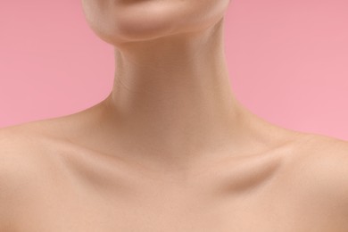 Beauty concept. Woman on pink background, closeup