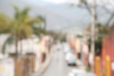 San Pedro Garza Garcia, Mexico – February 8, 2023: Blurred view of street with cars and beautiful buildings