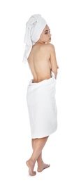 Young pretty woman with towels on white background