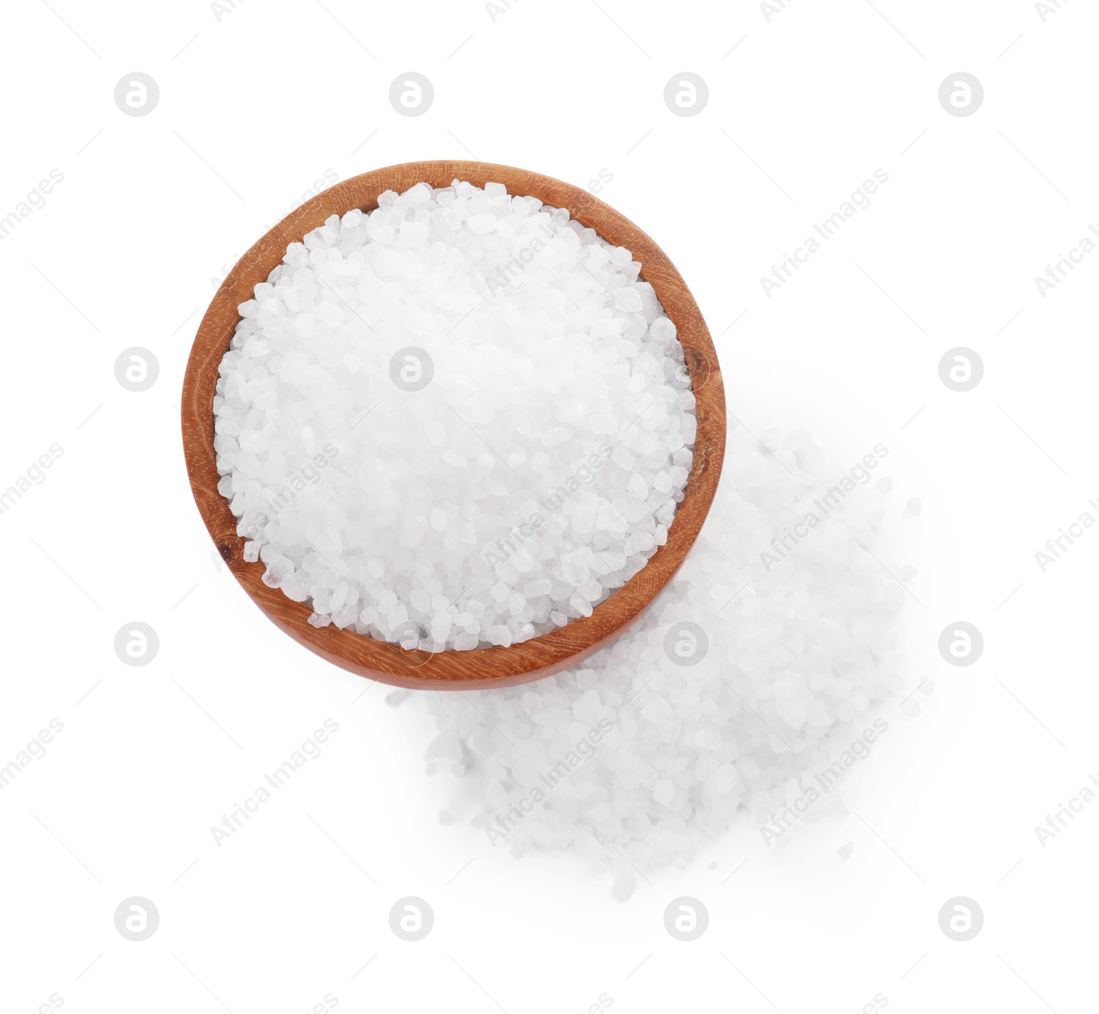 Photo of Wooden bowl and heap of natural sea salt isolated on white, top view
