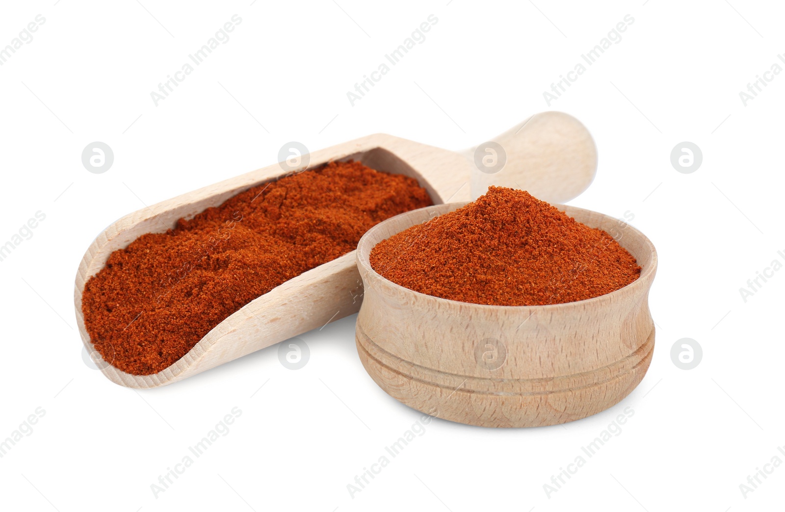 Photo of Scoop and bowl with aromatic paprika isolated on white