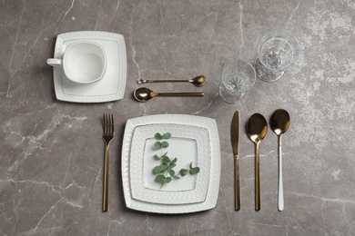 Photo of Stylish elegant table setting on marble background, top view