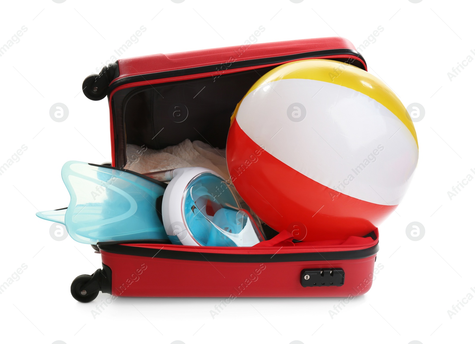 Photo of Open suitcase with beach accessories  on white background