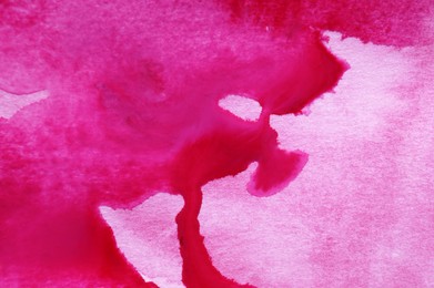 Photo of Abstract pink ink painting as background, top view