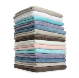 Photo of Different fresh soft terry towels on white background