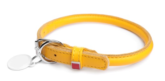 Photo of Yellow leather dog collar with tag isolated on white
