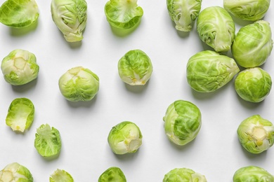 Photo of Tasty fresh Brussels sprouts on white background, top view