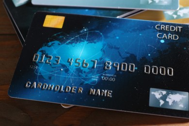 Many plastic credit cards on table, closeup