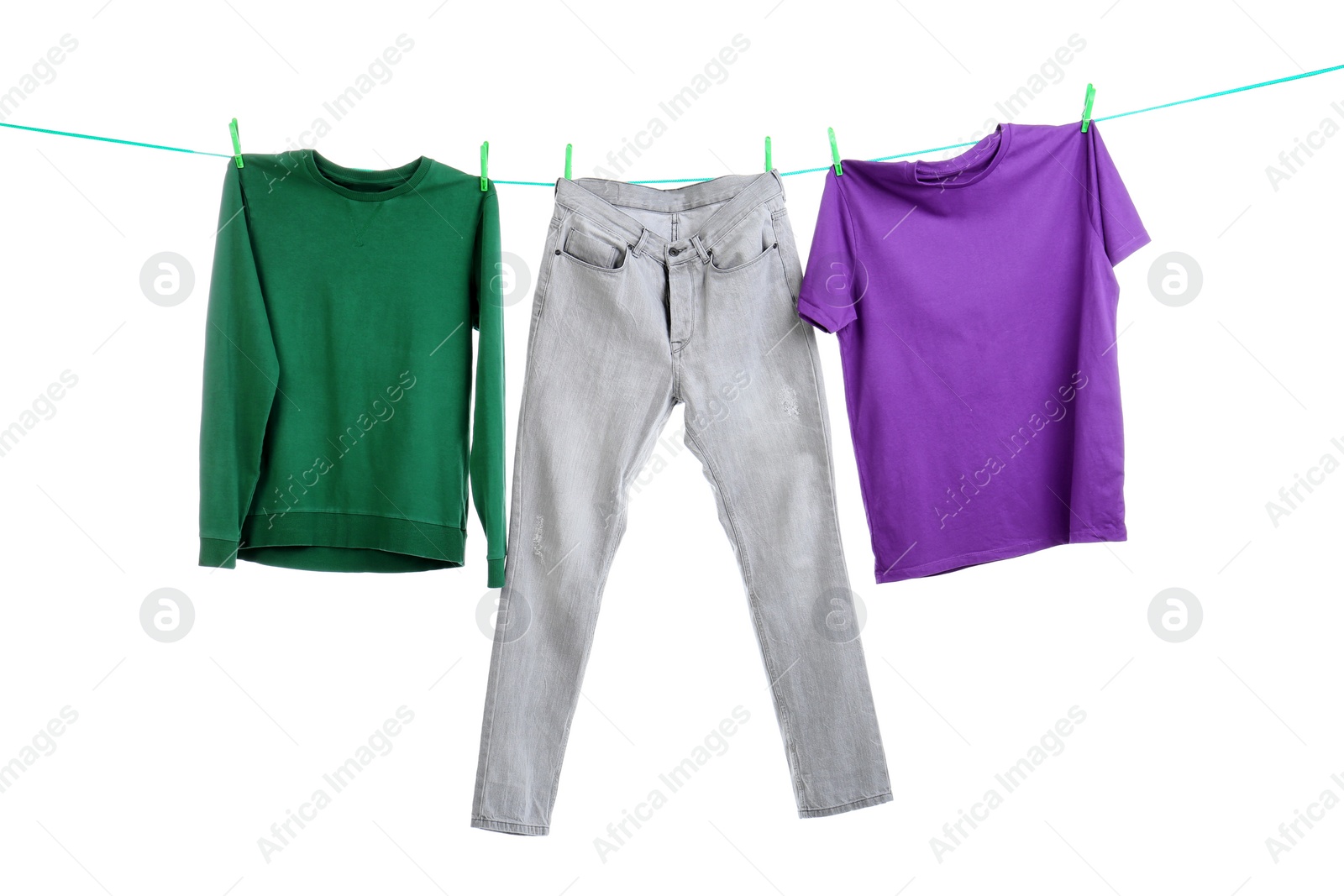 Photo of Clothes on laundry line against white background