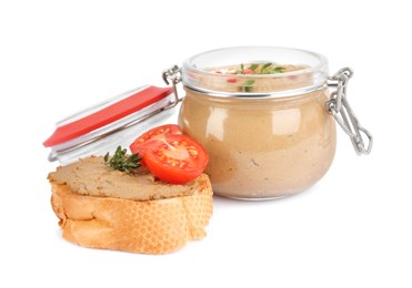 Photo of Fresh bread and glass jar with delicious liver pate on white background