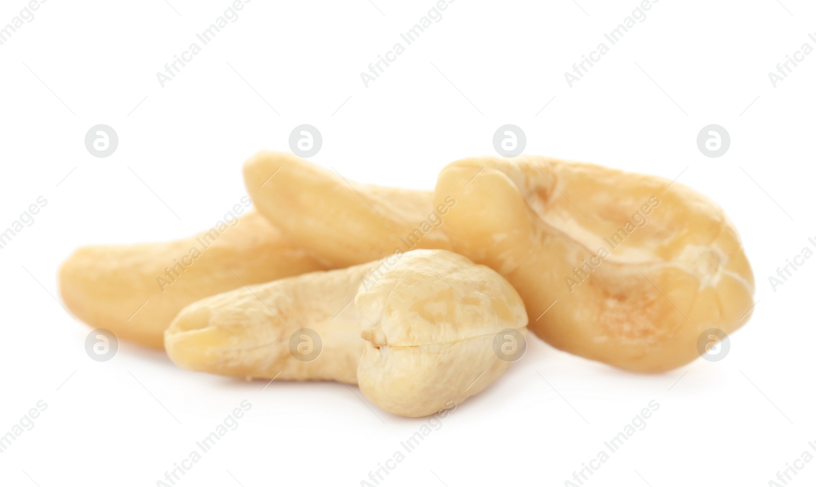 Photo of Pile of tasty organic cashew nuts isolated on white