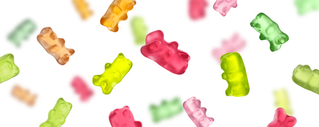 Set of delicious jelly bears falling on white background, banner design 