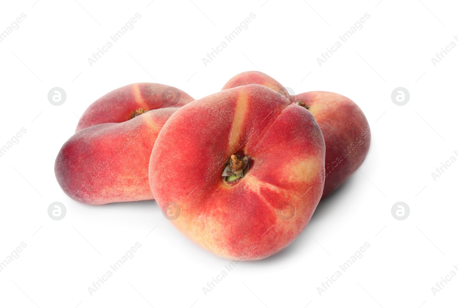 Photo of Fresh ripe donut peaches on white background