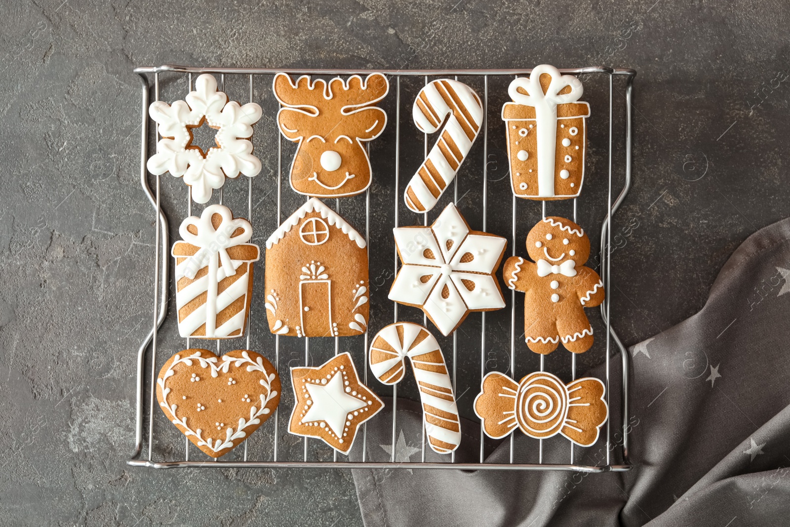 Photo of Delicious homemade Christmas cookies on grey table, top view