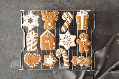 Photo of Delicious homemade Christmas cookies on grey table, top view