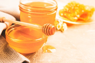 Image of Tasty fresh honey on table, closeup view