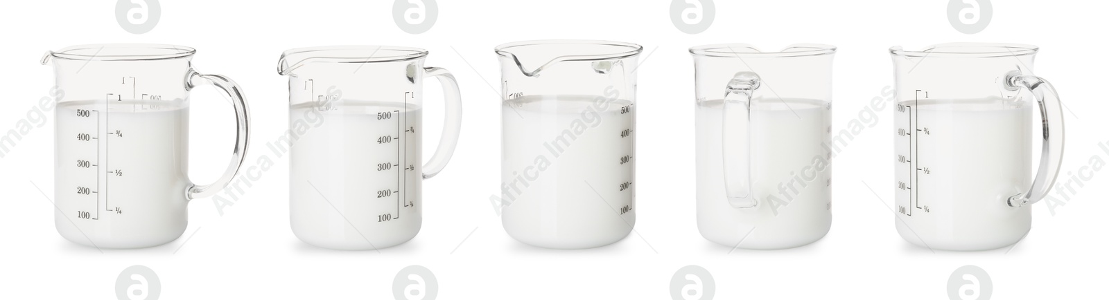 Image of Fresh milk in measuring cup isolated on white, set