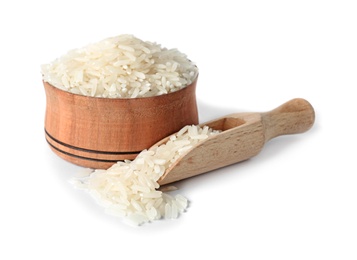 Bowl and scoop with uncooked long grain rice on white background